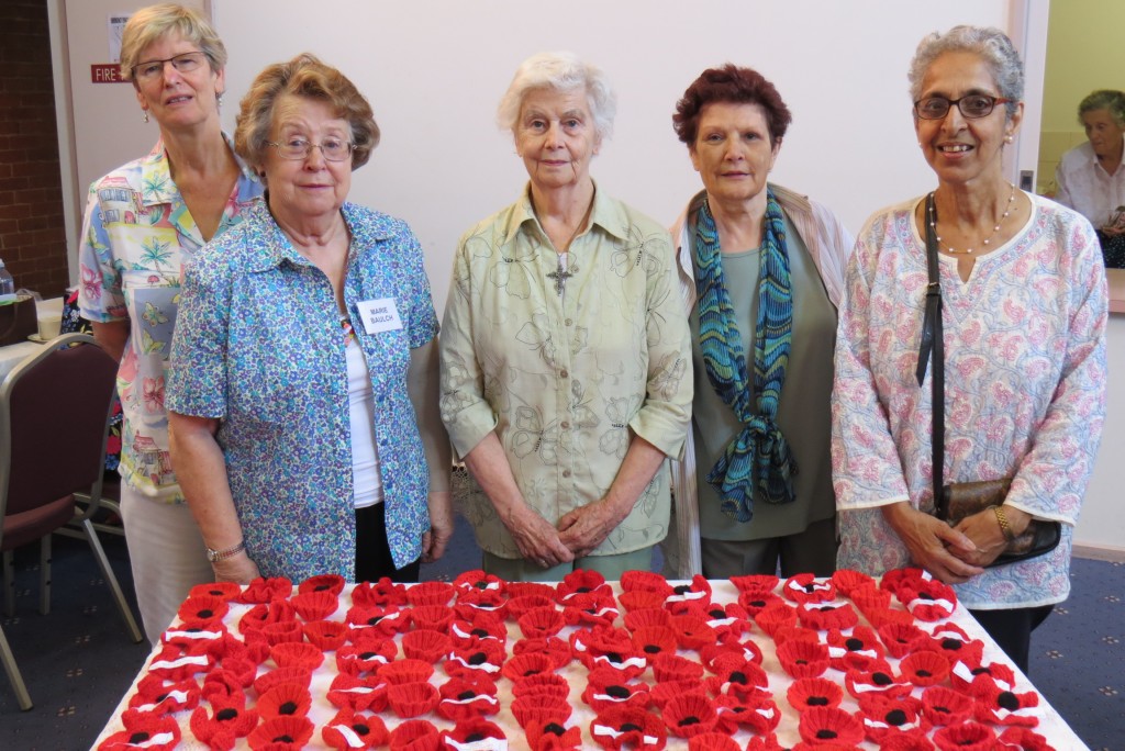 Craft Group members with poppies for Remembrance Day